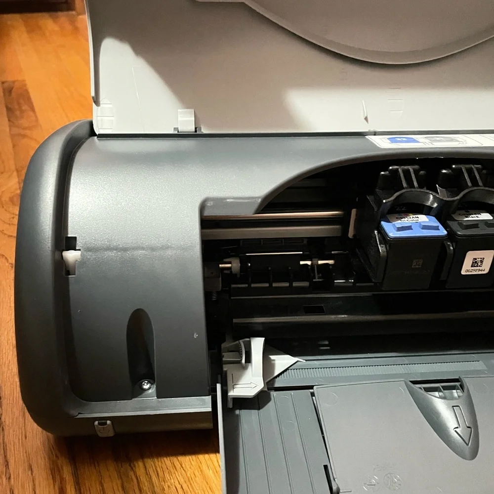 HP Deskjet Printer with Blue and Orange Box
